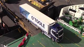 Trucks boarding ship, Dublin, Ireland, May 2021.