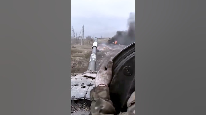 Russian soldiers flee after their T 80 tank is hit by Javelin missile