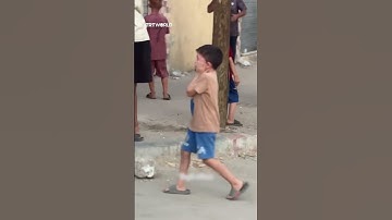 Palestinian child in distress as Israeli forces threaten strike near residence