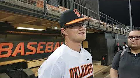 Jensen Elliott talks with the media post West Virg...