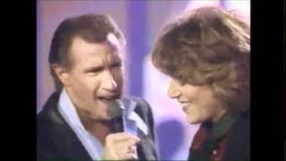 Bill Medley and Jennifer Warnes.  The Time Of My Life