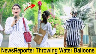 News Reporter Throwing Water Balloons Prank@crazycomedy9838