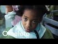 A teased Black girl gets her hair straightened for the first time. | Mahalia Melts In the Rain