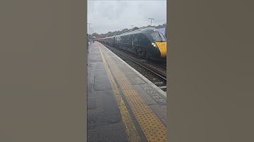 A GWR Class 802 (802106) arriving into Platform 4 at Exeter St Davids and departing Platform 4 to