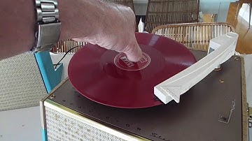 RCA PORTABLE stereo record player, 4 speed playing a 78 RPM record