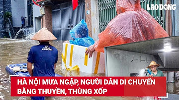 Hà Nội mưa ngập, người dân di chuyển bằng thuyền, thùng xốp | Báo Lao Động
