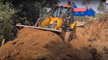 Jcb Backhoe machine pushing soil in hill site road cutting and leveling  @roadtrendmachinework