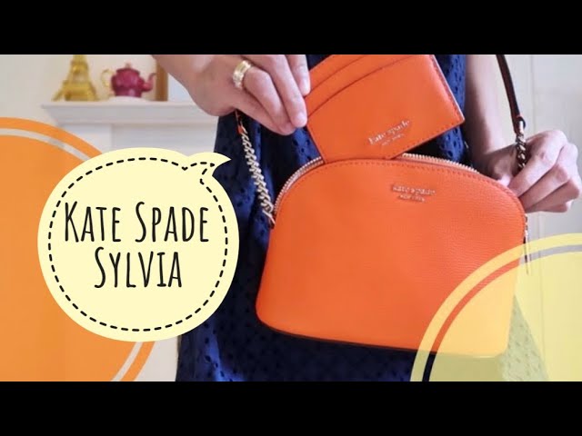 Kate Spade Sylvia Small Dome Cross Body Bag in Orange