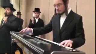 moshe arye lefkowitz playing at his first wedding