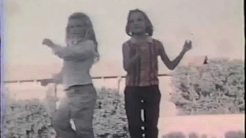 Allyson and Diana playing in backyard and dancing;...