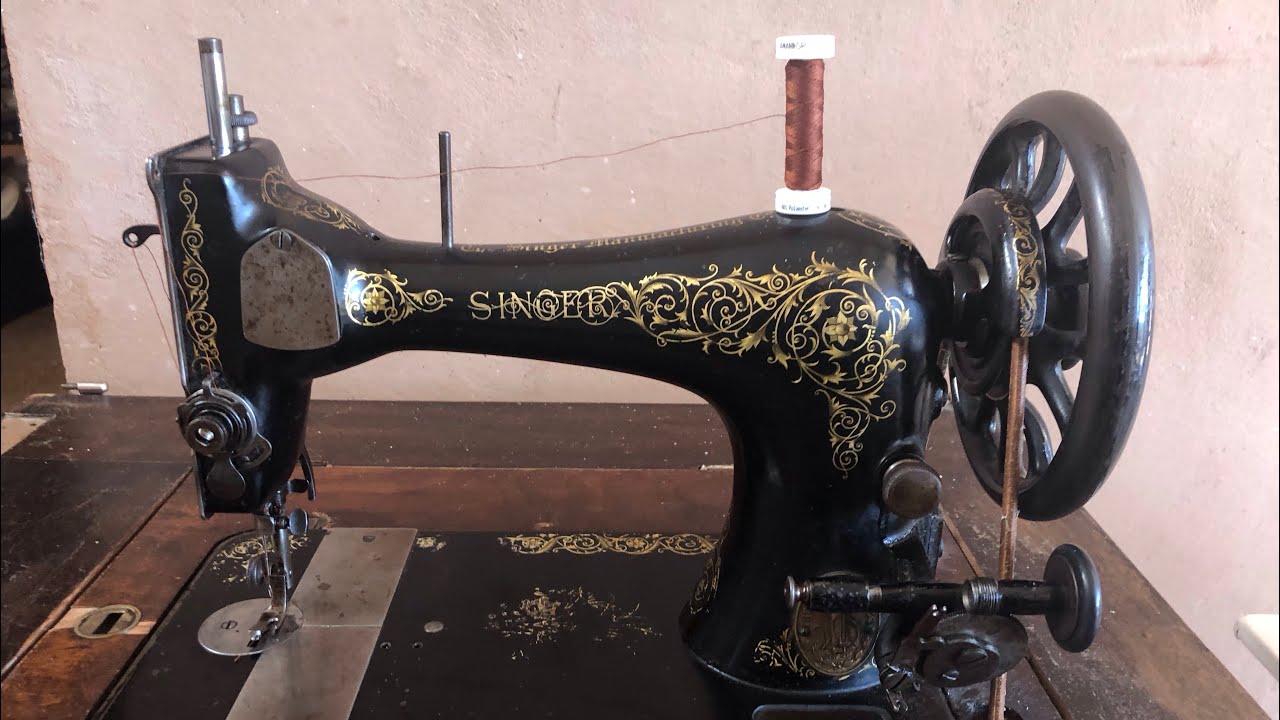 Machine à coudre Singer ancienne à pédale