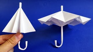 картинка: Как сделать зонтик из бумаги - ОТКРЫВАЕТСЯ и ЗАКРЫВАЕТСЯ - оригами зонтик 🌂