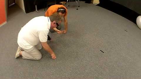 Blind man visually picks up objects through visual-to-auditory sensory substitution
