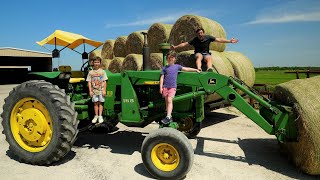 Hudson and Holly run the farm for a day | Tractors for kids