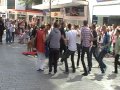 Man dancing in Liverpool (crowd join in)