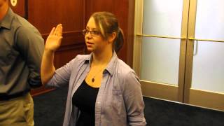 Payton taking the U.S. Military Enlistment Oath