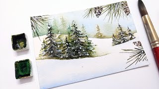 Step by step layered winter pine trees » How to paint a watercolor winter landscape for beginners