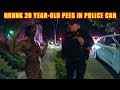 Drunk 20-Year-Old Urinates in Back of Police Car
