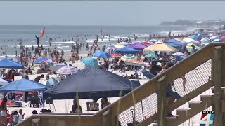 Police out in full force as thousands hit Jacksonville Beach to celebrate Memorial Day