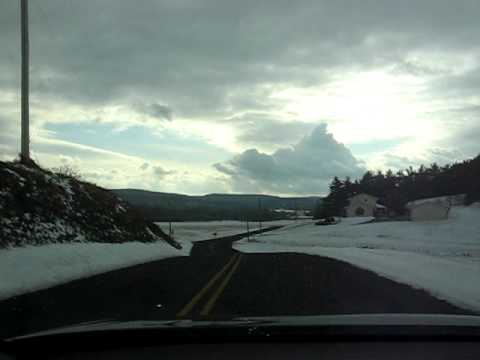 1/1/10 Driving along in Newville in south central Pennsylvania looking around at the snow covered scenery on New Years Day. Don't mind the talking, my girlfriend and I were talking about the band playing on the radio.