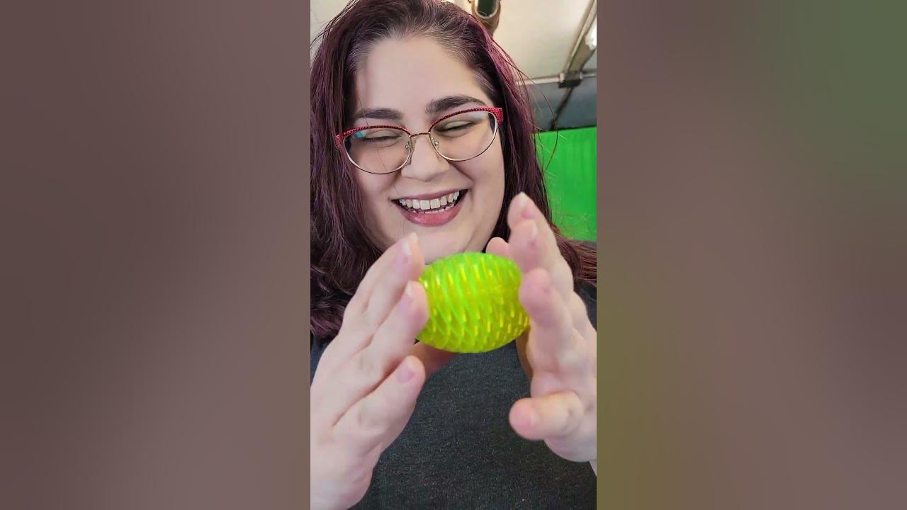 Aerial view of Sarah reacting to our new fidget toy, the morf worm! Li, fidget toys