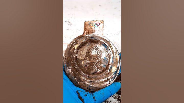 Cleaning The DIRTIEST Olympic Silver Medal Ever!