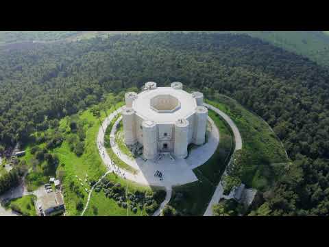 Castel Del Monte in Puglia, Italy -  4k drone shot of a medieval castle with octagonal shape.