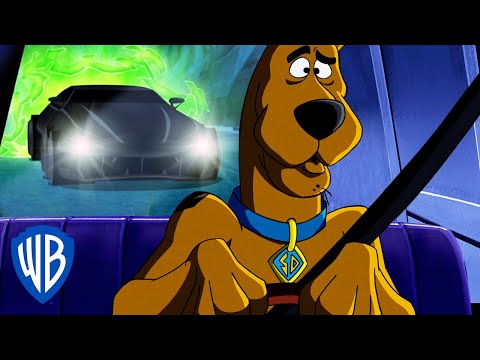 Scooby-Doo! en Latino | Siguiendo de cerca 🚗 | WB Kids