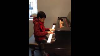 Joey Alexander trying a piano