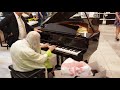 Street pianist natalie trayling amazes shoppers at david jones department store