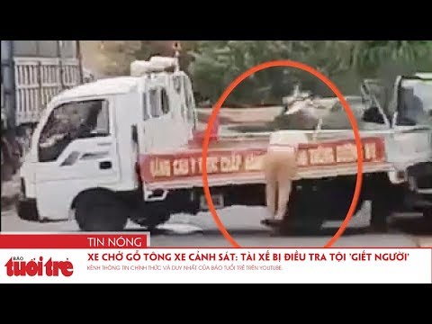 Video Xe chở gỗ tông thẳng xe cảnh sát: Tài xế bị điều tra... - youtube