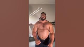 Thick and beefy shirtless muscle bear dancing for our entertainment