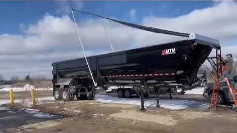 Electric flip tarp system can cover trailers up to 40 feet
