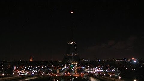 Eiffel Tower goes dark as France mourns
