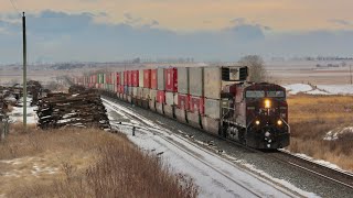 VERY FAST!!!! CP 8760, CP 8045, and CP 8813 lead CP 100 east at Strangmuir, Alberta