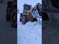 Chinese front loader stuck in snow