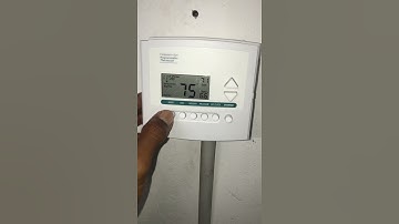 Going through the various Mode options on a Commercial Programmable Thermostat