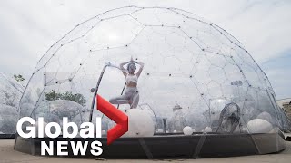 Coronavirus: Yoga enthusiasts bend the rules at hot yoga dome pop-up in Toronto