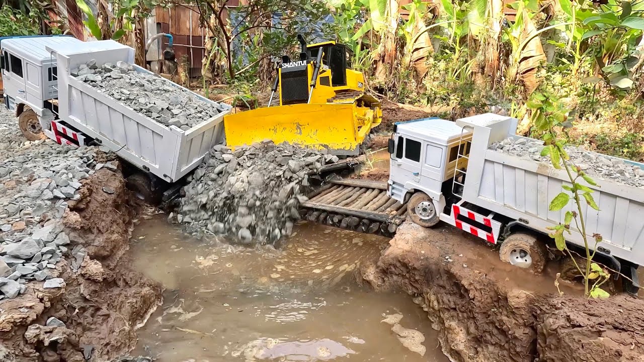 Incredible Rescue! Heavy Dump Truck Hauling Rock Gets Stuck After Bridge Collapse