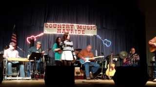 Cheyenne singing Folsom Prison Blues at the Hayride.