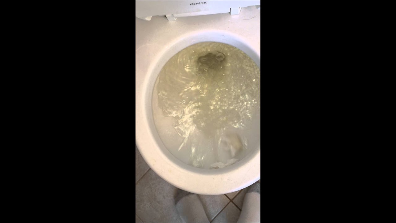 47. 2002 Kohler Rialto toilet flushing with 1 main jet and 1 small jet
