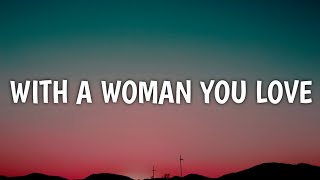 Video thumbnail of "Justin Moore - With A Woman You Love (Lyrics)"
