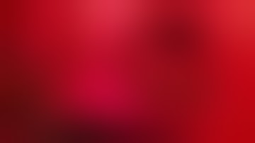 ball python eating a live mouse