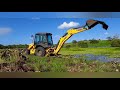Último vídeo com a retrô escavadeira New Holland B95B em Limpeza de açude com implemento!😎💪
