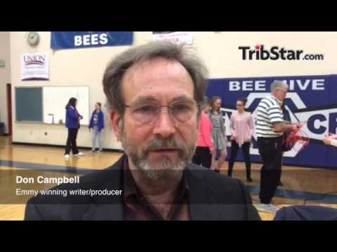 Emmy-winning writer/producer Don Campbell tells students at Honey Creek Middle School's Writers Fair