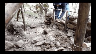 Building small warm survival hut \ Bushcraft earth hut with moss roof and stone clay fireplace