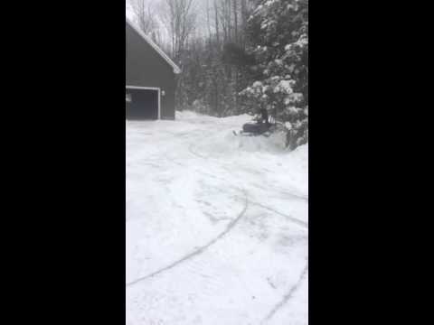 (Snapchat) Me jumping a bank of powder (2009 Polaris Transport 340)