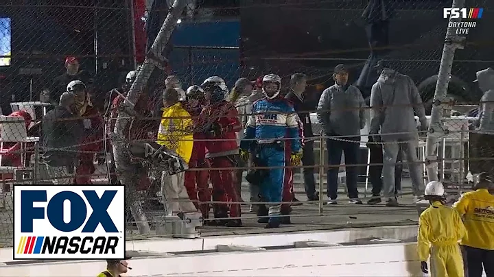 Michael Jordan & Bubba Wallace inspect the damage ...