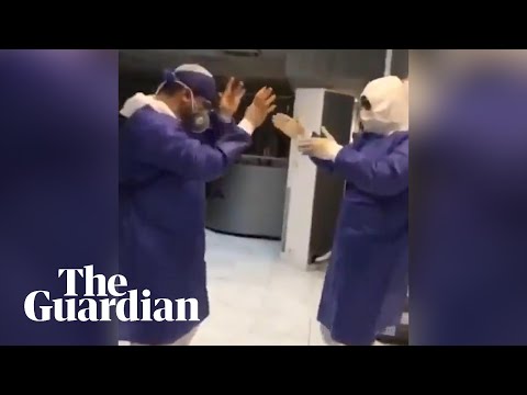 Coronavirus: doctors and nurses in Iran filmed dancing in bid to boost morale