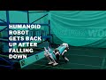 Humanoid robot gets back up after falling